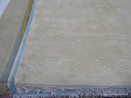 HAND WOVEN RUG; 100% VIRGIN WOOL PILE CHAMPAGNE COLORED GENUINE JINJAK RUG. HAND WOVEN IN INDIA. HAS