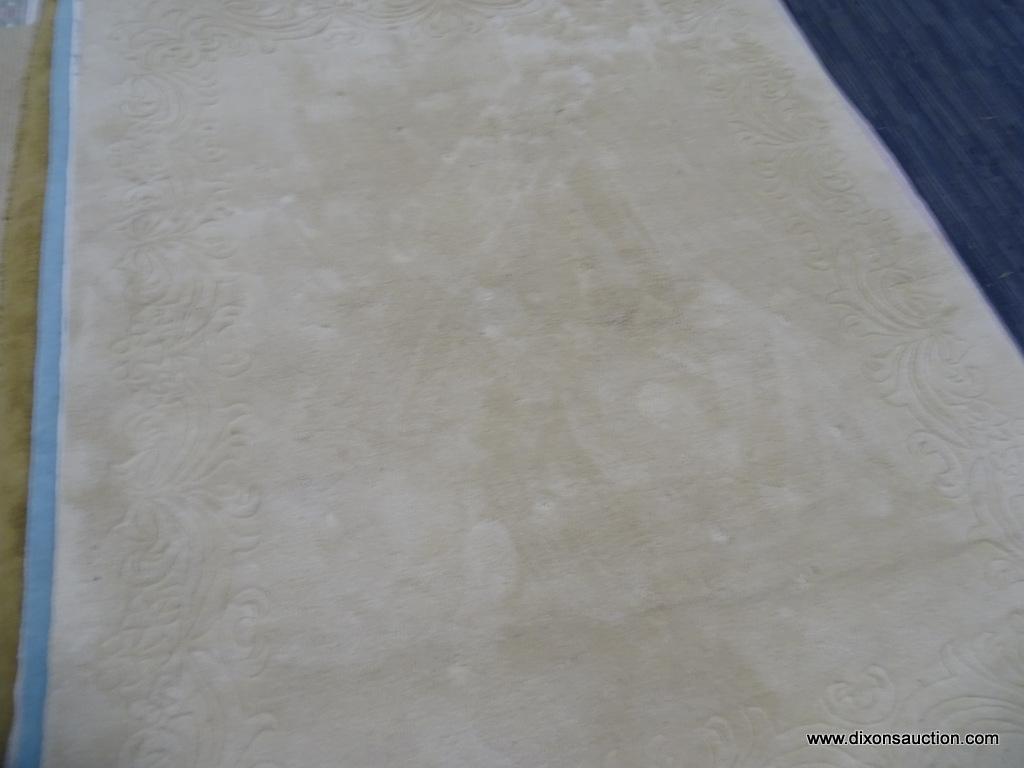 HAND WOVEN RUG; 100% VIRGIN WOOL PILE CHAMPAGNE COLORED GENUINE JINJAK RUG. HAND WOVEN IN INDIA. HAS