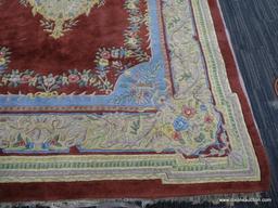 CAPEL SCULPTED AREA RUG; "EDEN" 100% SEMI-WORST PILE RED AREA RUG WITH FLORAL ENTER MEDALLION AND