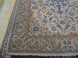 HAND KNOTTED AREA RUG; NEUTRAL TONE FLORAL AREA RUG IN CREAM, AND TAN WITH BLUE, ORANGE AND BROWN