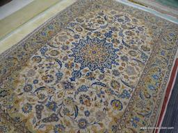 HAND KNOTTED AREA RUG; NEUTRAL TONE FLORAL AREA RUG IN CREAM, AND TAN WITH BLUE, ORANGE AND BROWN