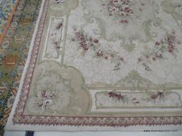 BEAULIEU AREA RUG; MACHINE MADE "ROSEFLOR" TAN AND SAGE GREEN AREA RUG WITH PINK AND WINE COLORED