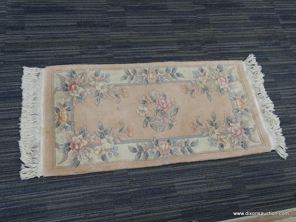 SCULPTED FLORAL RUG; HAND KNOTTED WITH COLORS OF PALE PINK, PALE GREEN & CREAM. MEASURES 2' 1" X 4'