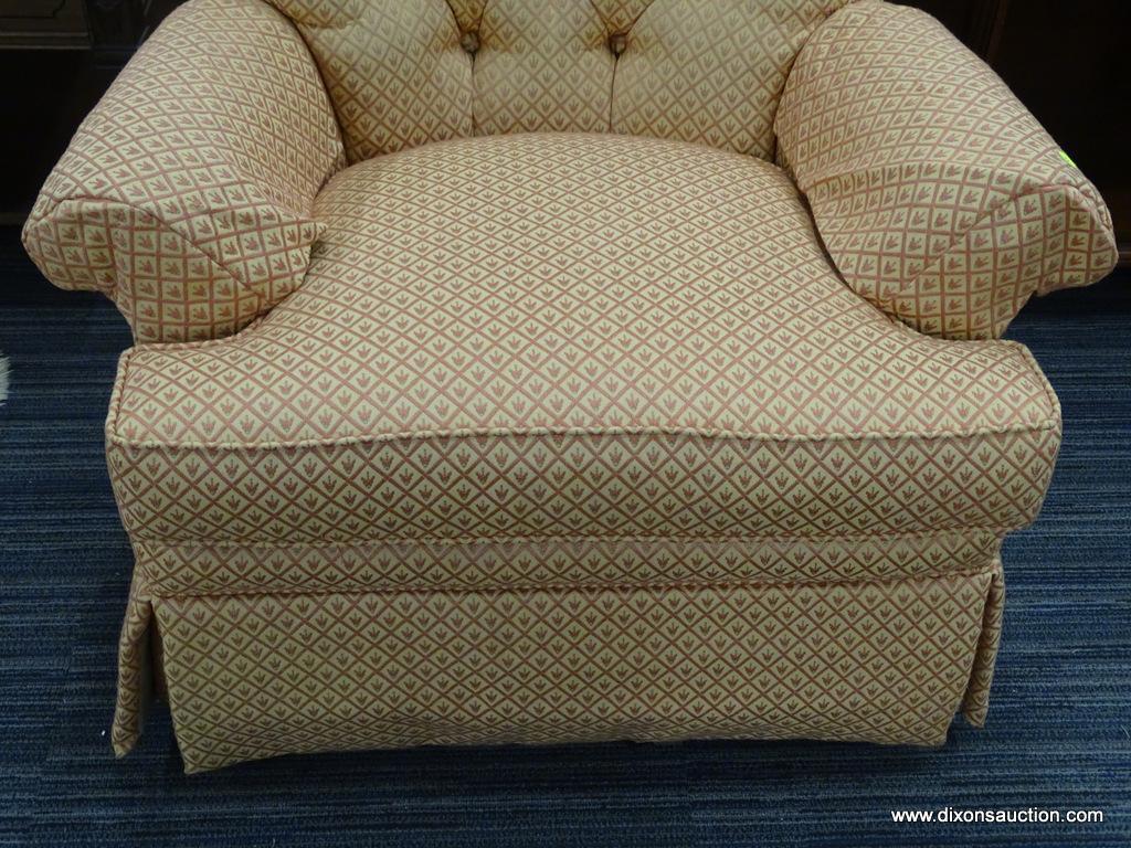 ACCENT CHAIR; ACCENT ARMCHAIR ON A SWIVEL WITH AN ORANGE AND PEACH FLORAL DETAILED FABRIC AND ARM