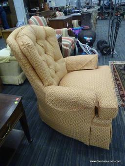 ACCENT CHAIR; ACCENT ARMCHAIR ON A SWIVEL WITH AN ORANGE AND PEACH FLORAL DETAILED FABRIC AND ARM