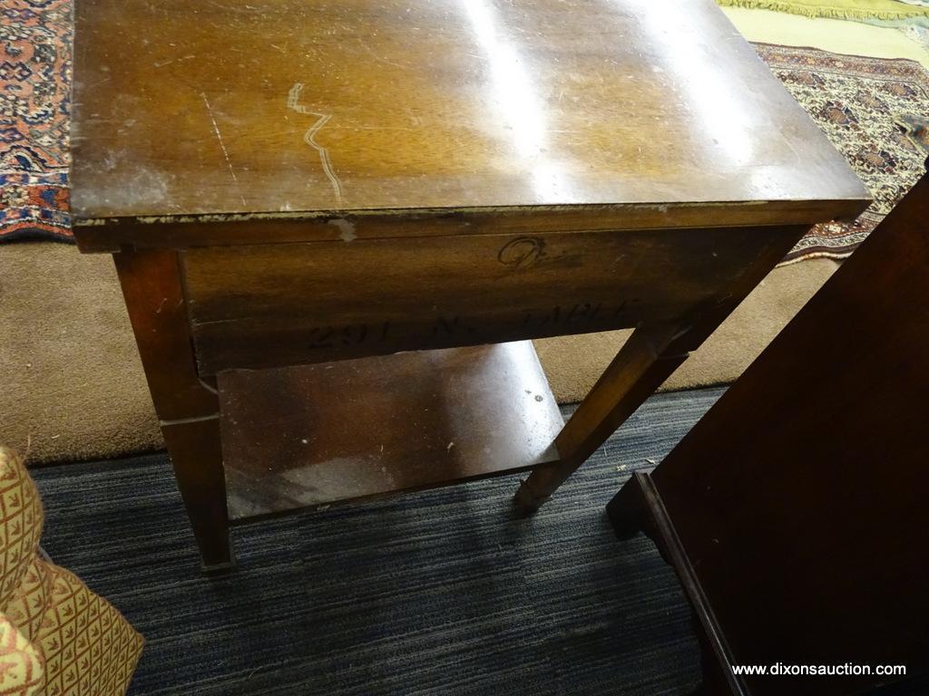 DIXIE END TABLE; WOODEN END TABLE WITH A SERPENTINE FRONT, A TOP DRAWER, AND A LOWER SHELF. TABLE