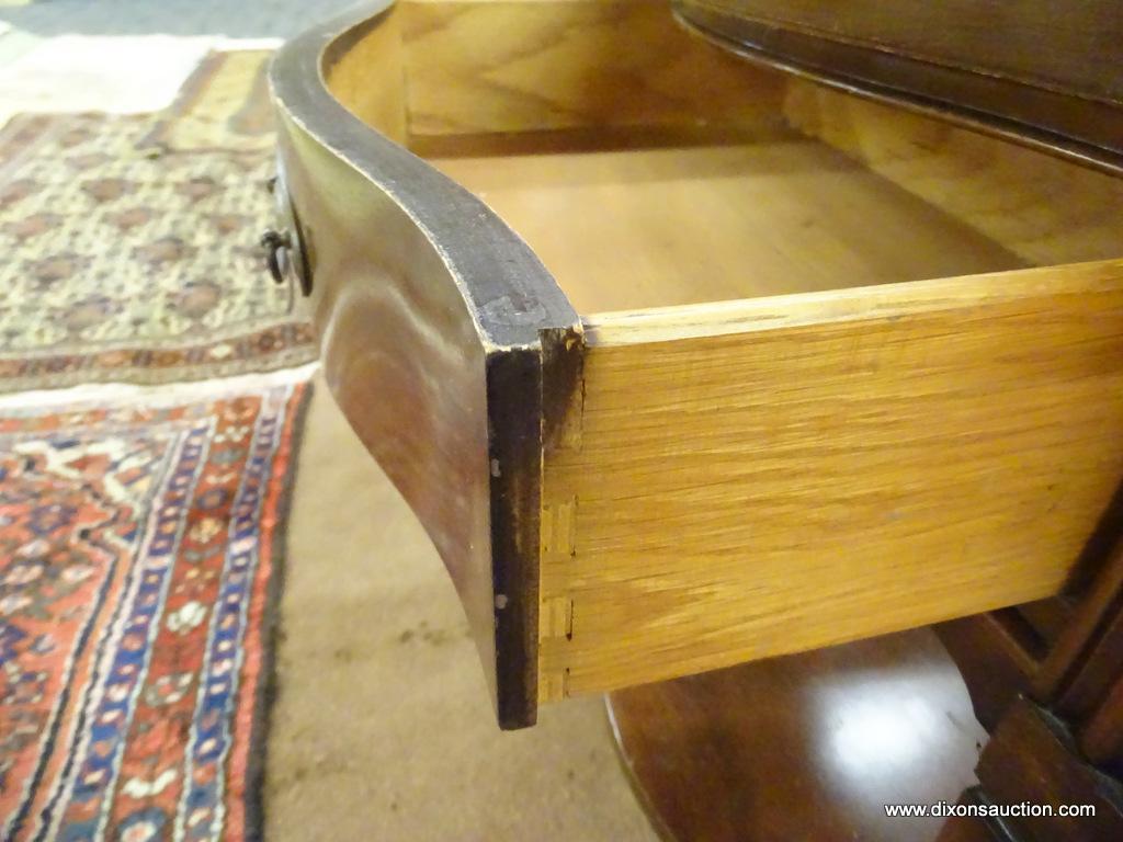 DIXIE END TABLE; WOODEN END TABLE WITH A SERPENTINE FRONT, A TOP DRAWER, AND A LOWER SHELF. TABLE