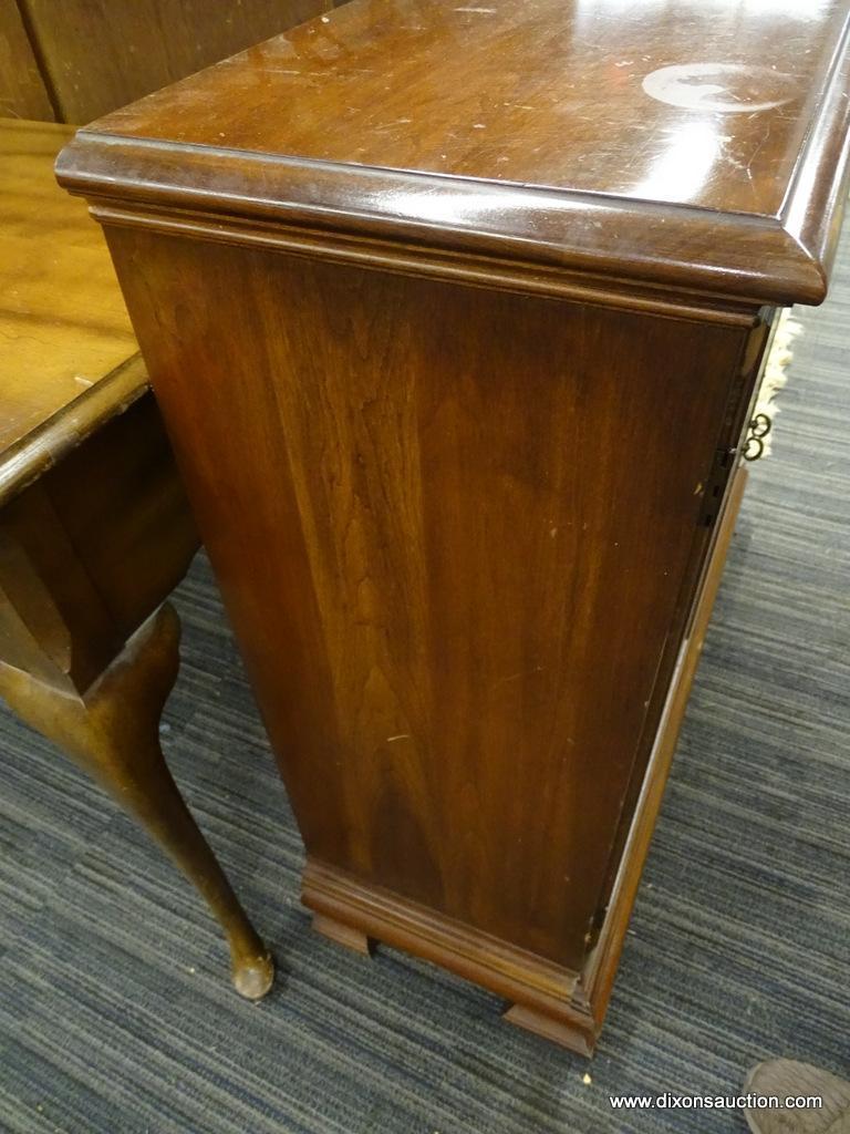 WOODEN CABINET; MAHOGANY CABINET WITH 2 BI-FOLD OPENING DOORS WITH METAL KNOBS THAT OPENS TO REVEAL