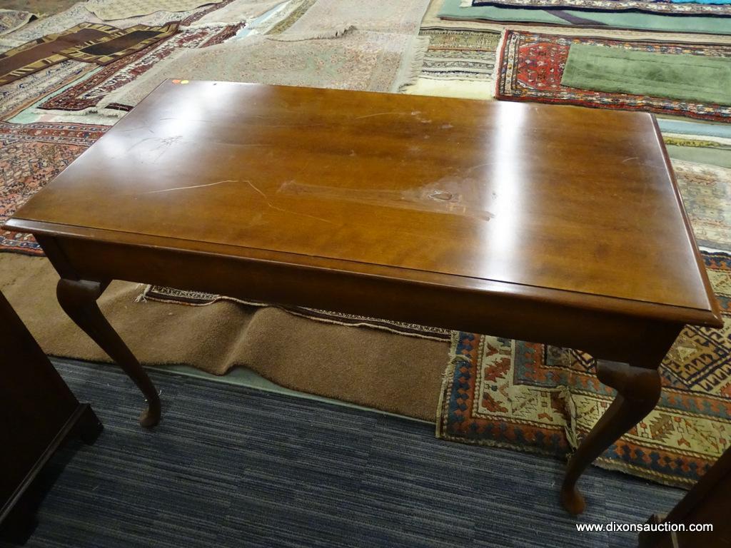 WOODEN END TABLE; WOOD GRAIN END TABLE THAT HAS 3 TOP DOVETAIL DRAWERS WITH METAL BATWING PULLS.