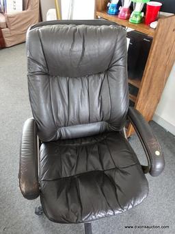 (R4) OFFICE CHAIR; FAUX BLACK LEATHER OFFICE CHAIR. HAS MINOR WEAR. MEASURES 26 IN X 24 IN X 47 IN.