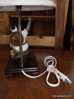 (R5) ORIENTAL LAMP; ORIENTAL MUD-MAD LAMP WITH A BELL SHAPED LAMP SHADE. RESTS ON A ROSEWOOD BASE.