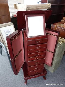 (R6) JEWELRY ARMOIRE; CHERRY QUEEN ANNE ARMOIRE WITH 8 DRAWERS, A LIFT MIRROR TOP, AND 2 SIDE DOORS