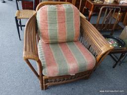 (R4) RATTAN ARM CHAIR; BENCHCRAFT RATTAN ARM CHAIR WITH CUSHIONS. CUSHIONS SHOW WEAR. OVERALL