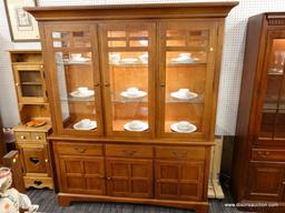 (R1) CHINA CABINET; 2 PIECE CHINA CABINET. TOP PIECE HAS 3 FRONT GLASS DOORS THAT OPEN TO REVEAL 2