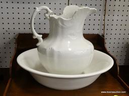 (R1) PITCHER WITH BASIN; HOMER LAUGHLIN, WHITE WASH BASIN WITH SHELL DETAILED PITCHER. BASIN HAS A