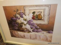 (WALL) FRAMED STILL LIFE; DEPICTS A WHITE AND VIOLET FLOWER ARRANGEMENT WITH A FRAMED PAINTING OF AN