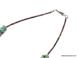 TURQUOISE NECKLACE; SMALL STONE TURQUOISE NECKLACE WITH SMALL BROWN BEADS. HAS A HOOK CLOSURE. 15 IN