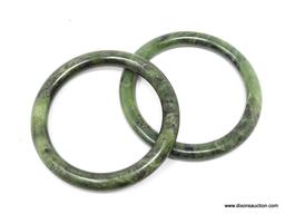 PAIR OF JADE BRACELETS; 2 SOLID DARK JADE BRACELETS. EACH MEASURES 3 IN DIAMETER.