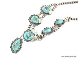 STERLING SILVER AND TURQUOISE NECKLACE; HANDMADE SQUASH BLOSSOM SILVER AND TURQUOISE NECKLACE WITH