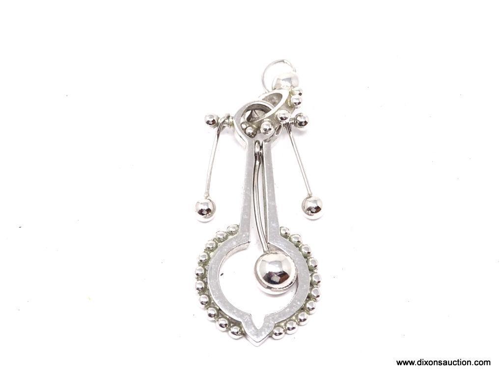 STERLING SILVER PENDANT; CM & O STERLING SILVER DROP PENDANT. MEASURES 2 IN LONG.