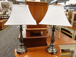 (R1) PAIR OF BRUSHED METAL TABLE LAMPS; EACH TABLE LAMP HAS A RECTANGULAR SHAPED WHITE LAMP SHADE