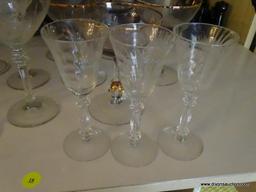 (LR) SHELF LOT OF STEMWARE; LOT CONTAINS 4 ETCHED COLORED MATCHING CHAMPAGNE FLUTES, 5 AMETHYST AND