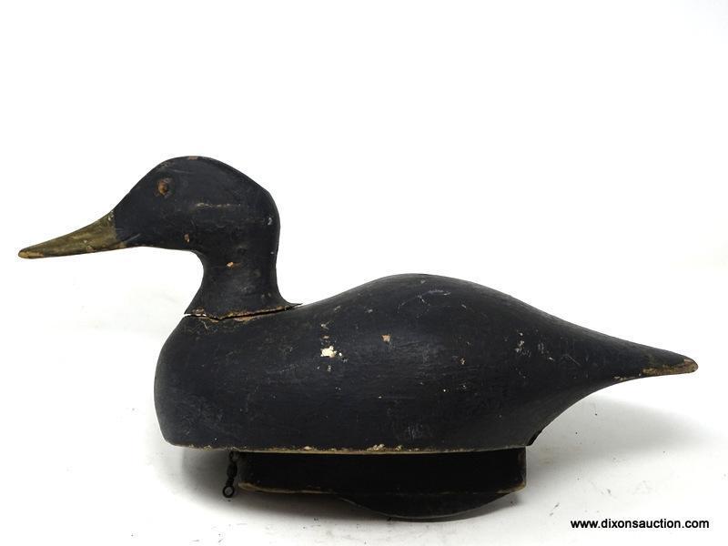 SOLID BODY BLACK DUCK DECOY WITH WOODEN KEEL. LEAD WEIGHT ATTACHED. WORKING DECOY. OLD GUNNERS