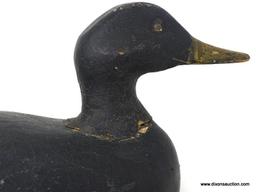 SOLID BODY BLACK DUCK DECOY WITH WOODEN KEEL. LEAD WEIGHT ATTACHED. WORKING DECOY. OLD GUNNERS