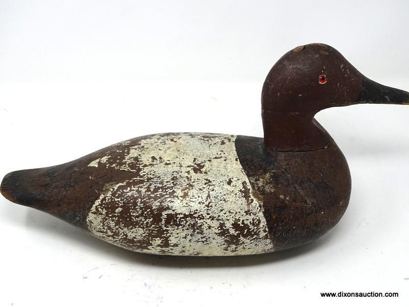 SOLID BODY WORKING DECOY. VINTAGE WEST COAST CANVASBACK DRAKE MADE OF REDWOOD. FLAT BOTTOM. LEAD