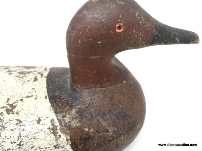 SOLID BODY WORKING DECOY. VINTAGE WEST COAST CANVASBACK DRAKE MADE OF REDWOOD. FLAT BOTTOM. LEAD