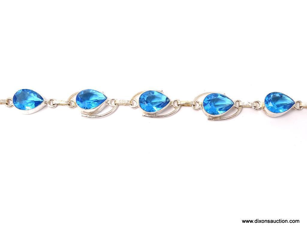 .925 TOPAZ BRACELET; NEW 7-8" GORGEOUS SWISS BLUE TOPAZ BRACELET WITH TOGGLE CLASP. SRP $ 69.00.