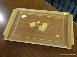 (R1) INLAID WOOD TRAY; HAS INLAID FLORAL CENTER AND TWO SCROLLING HANDLES. MEASURES 12.5 IN X 19.5