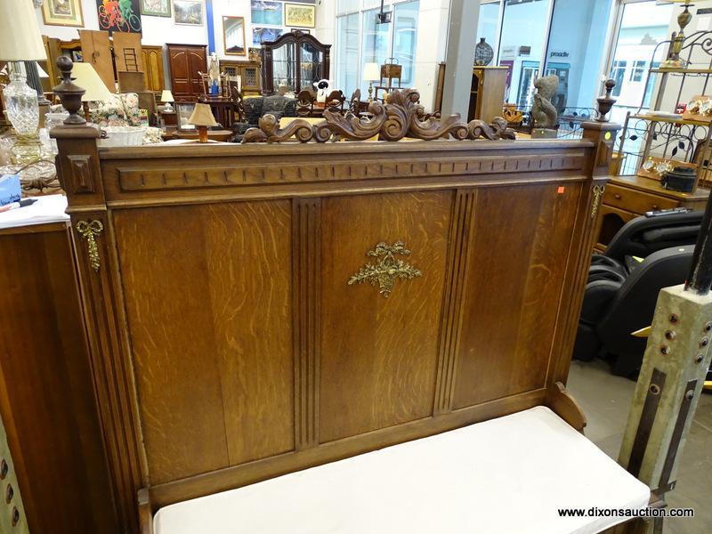 (R2) WOODEN CHURCH PEW; HAS REEDED DETAILING, ORNATE SCROLLING AT THE TOP, AND A WHITE BENCH