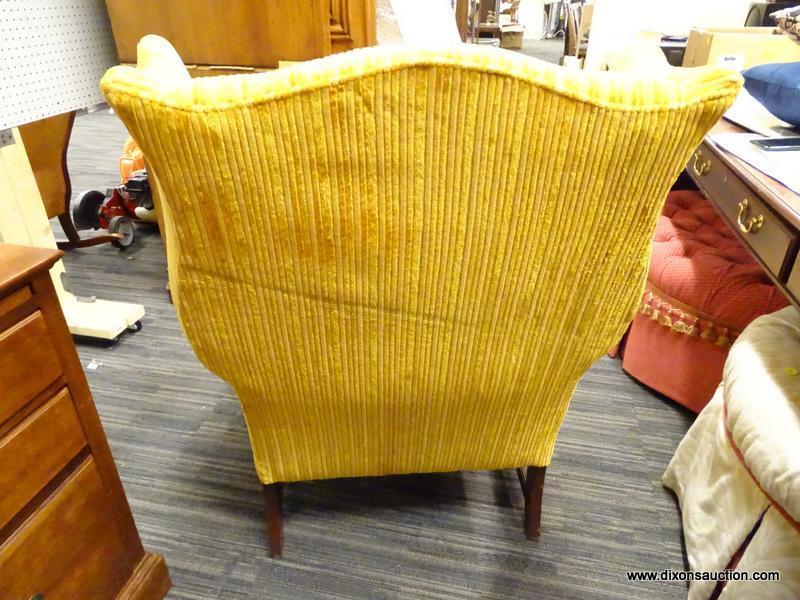 (R1) WING BACK ARM CHAIR; MULTI-TONED YELLOW FABRIC WINGBACK ARMCHAIR WITH NAILHEAD DETAILING. SITS