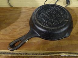 (R1) PETERBORO BASKET CO. BASKETS AND CRACKER BARREL CAST IRON SKILLET; 4 PIECE LOT TO INCLUDE THREE