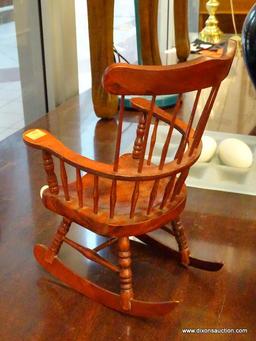 (WINDOW) DOLL ROCKING CHAIR; CHERRY FINISHED WOODEN, WINDSOR STYLE, DOLL'S ROCKING CHAIR.