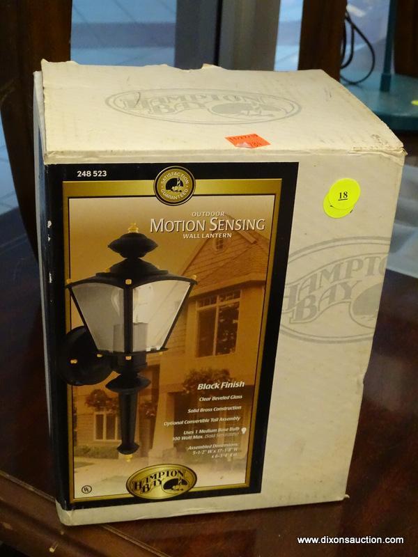 (WINDOW) HAMPTON BAY OUTDOOR, MOTION SENSING WALL LANTERN; COMES WITH A BLACK FINISH AND CLEAR