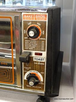 (WINDOW) GE TOASTER OVEN; VINTAGE, TOAST N BROIL "TOAST-R-OVEN". IN OVERALL GOOD CONDITION.