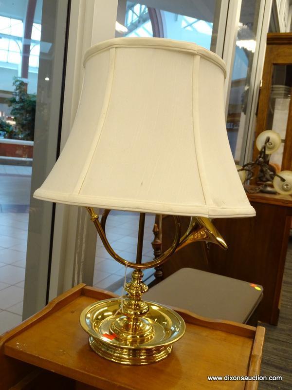 (WINDOW) FRENCH HORN TABLE LAMP; BRASS TABLE LAMP WITH A SAUCER SHAPED BASE AND A TURNED POLE STEM
