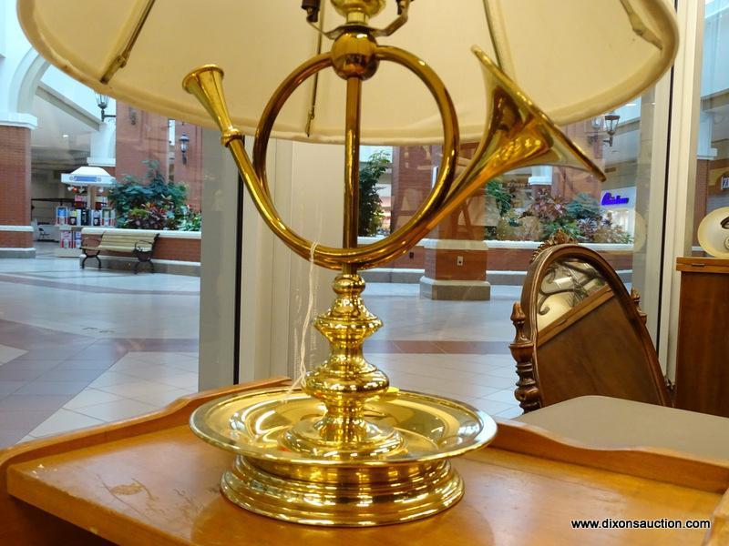 (WINDOW) FRENCH HORN TABLE LAMP; BRASS TABLE LAMP WITH A SAUCER SHAPED BASE AND A TURNED POLE STEM