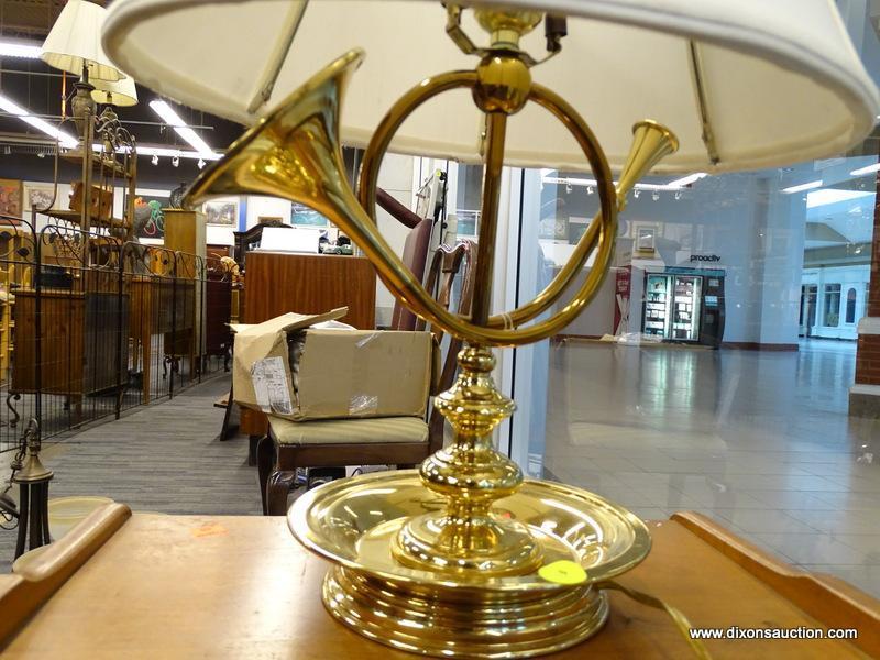 (WINDOW) FRENCH HORN TABLE LAMP; BRASS TABLE LAMP WITH A SAUCER SHAPED BASE AND A TURNED POLE STEM