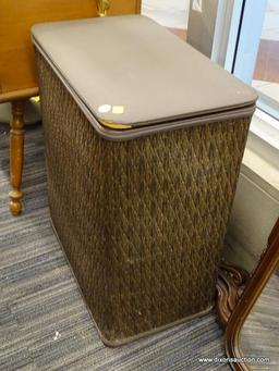 (WINDOW) BURLINGTON LAUNDRY BASKET; BROWN WICKER CLOTHES HAMPER. HAS A RIP ON THE FRONT RIGHT FABRIC