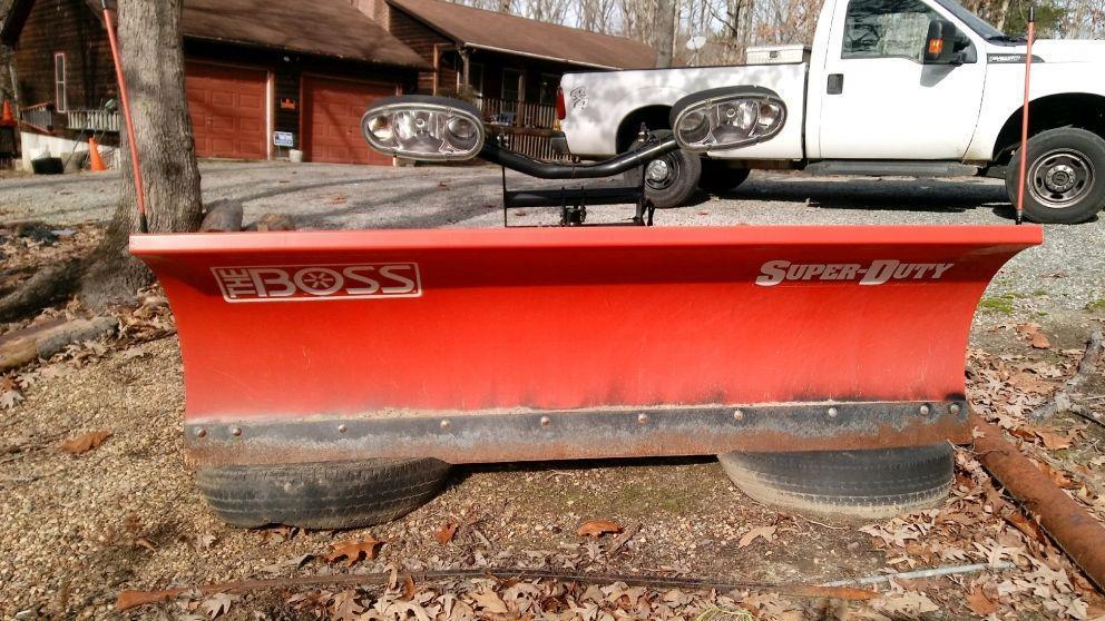 BOSS 8' Super-Duty straight-blade plows RESTORE ORDER with unsurpassed reliability and strength.