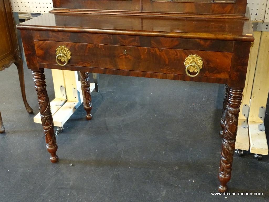 EXQUISITE FLAME MAHOGANY PULL OUT DRAWER WRITING DESK WITH A 24 PANE BOOKCASE TOP. VERY RARE. FROM