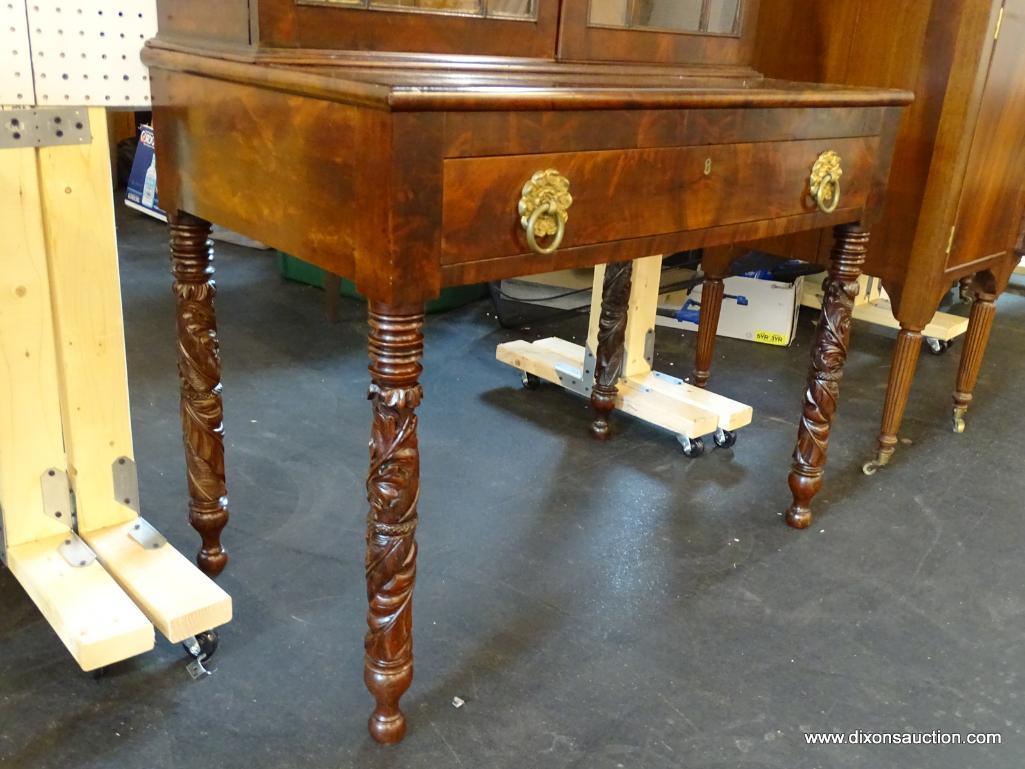 EXQUISITE FLAME MAHOGANY PULL OUT DRAWER WRITING DESK WITH A 24 PANE BOOKCASE TOP. VERY RARE. FROM