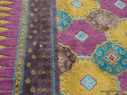 NEW YORK SCHENILLE AREA RUG; MACHINE WOVEN AREA RUG WITH A GEOMETRIC FLORAL PATTERN AND YELLOW,