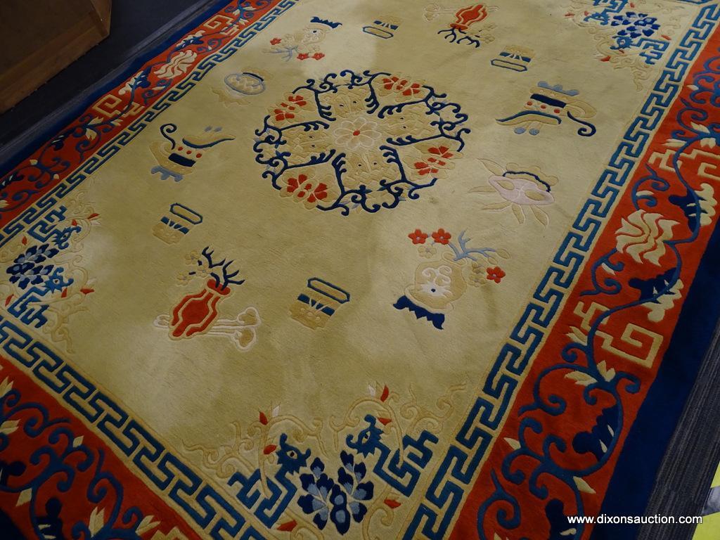 ORIENTAL AREA RUG; CREAM, BLUE, AND RED ORIENTAL AREA RUG WITH A FLORAL PATTERN. HAS A FLORAL