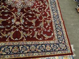 IMPERIAL AREA RUG; HEIRLOOM FLORAL PATTERNED AREA RUG WITH A WINE AND NAVY COLOR. MEASURES 7 FT 8 IN