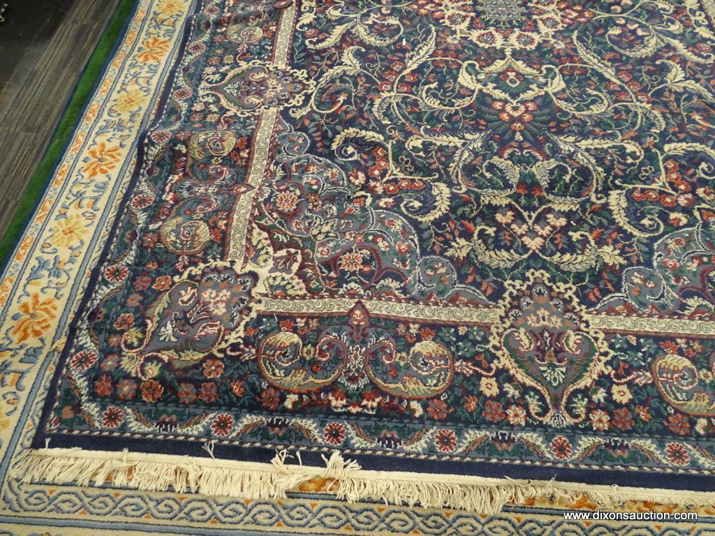 DALYN RUG COMPANY AREA RUG; CLASSICAL LEAVES AREA RUG WITH A NAVY COLOR. HAS FLORAL AND LEAF