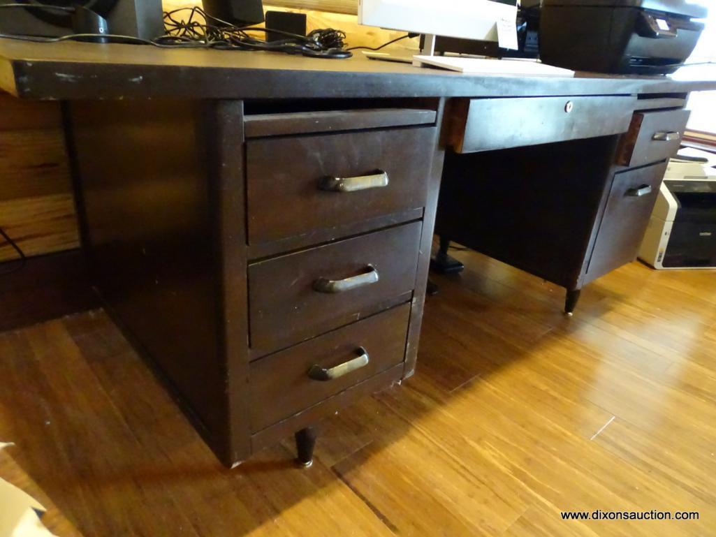 (BOFF) VINTAGE EXECUTIVE OFFICE DESK; WOOD GRAINED TOP, SIX DOVETAILED DRAWERS, SITS ON METAL